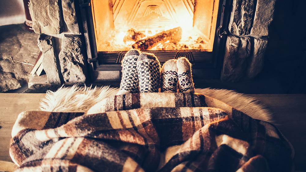 13 Tips for Staying Warm Without Turning Up the Heat